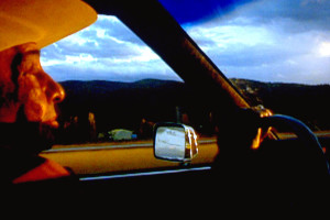 Grover Marks drives his Cadillac towards Spokane, Washington.